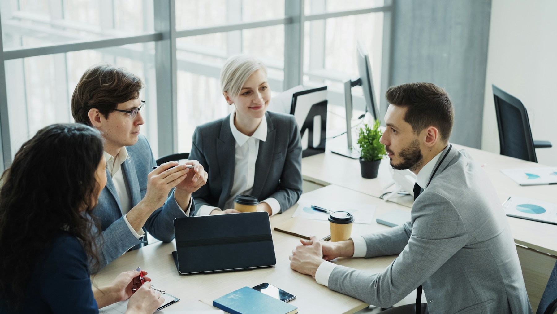 Professional services team coordinating client demand, delivery, and operating systems